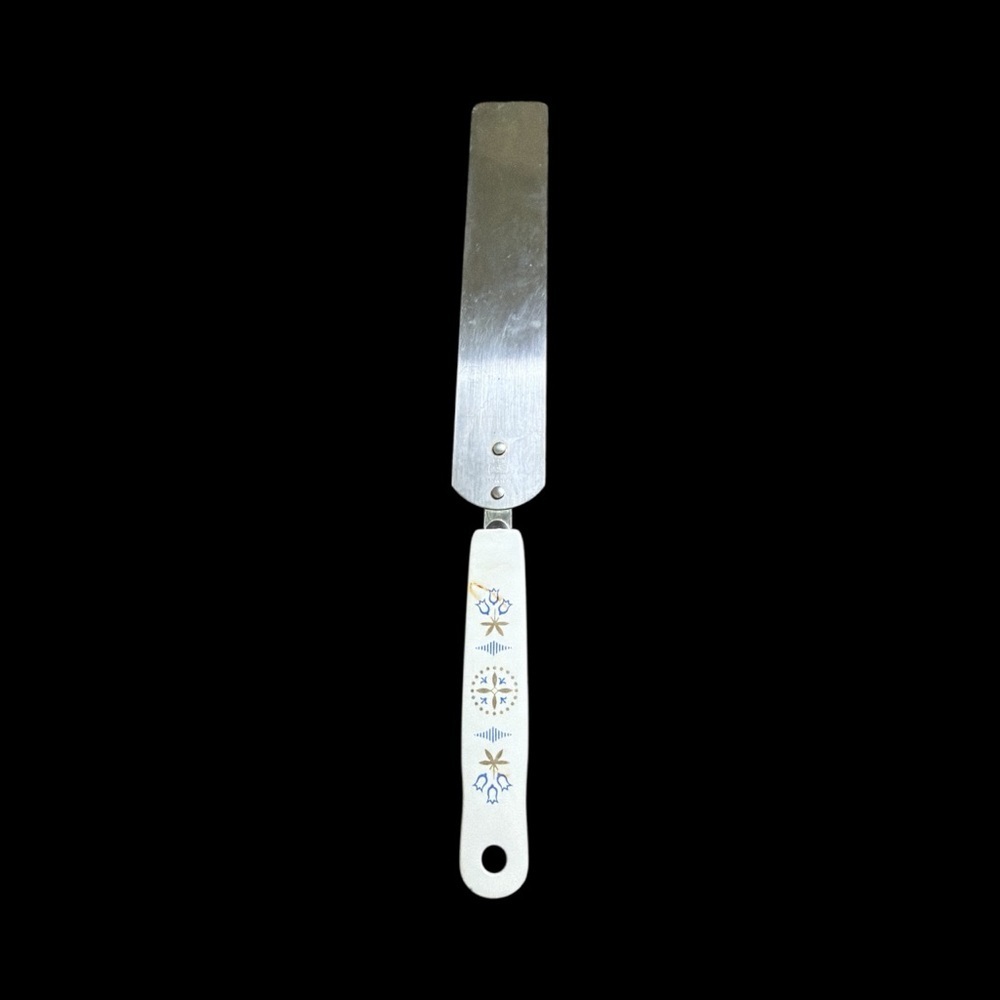 White and Silver Spatula with Floral Design